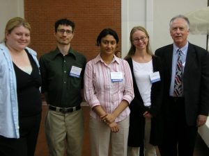 Photograph of four graduate students and Professor Emeritus, Edmund Burke III
